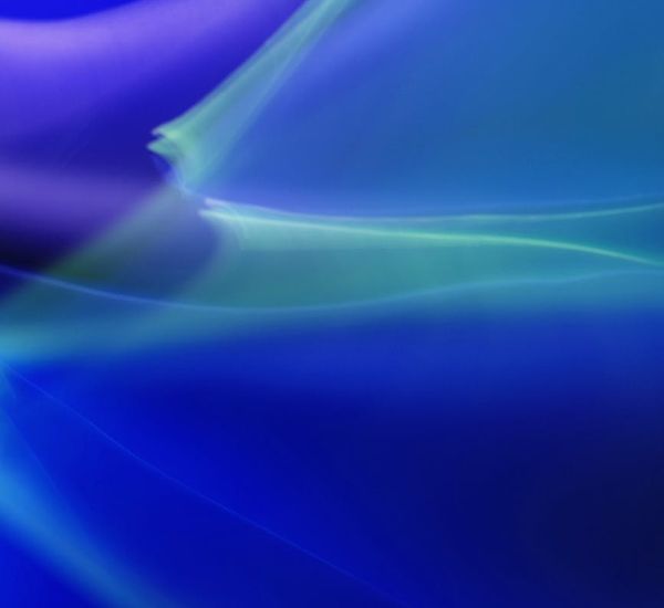 Abstract visual representation of sound waves in soft colors.